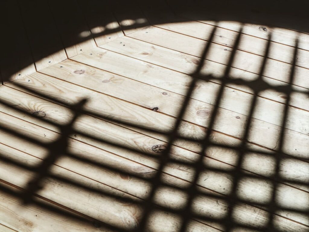 shadow of a tunduk on wooden floor